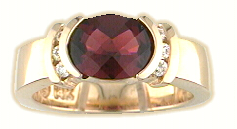 oval cut garnet and diamond ring